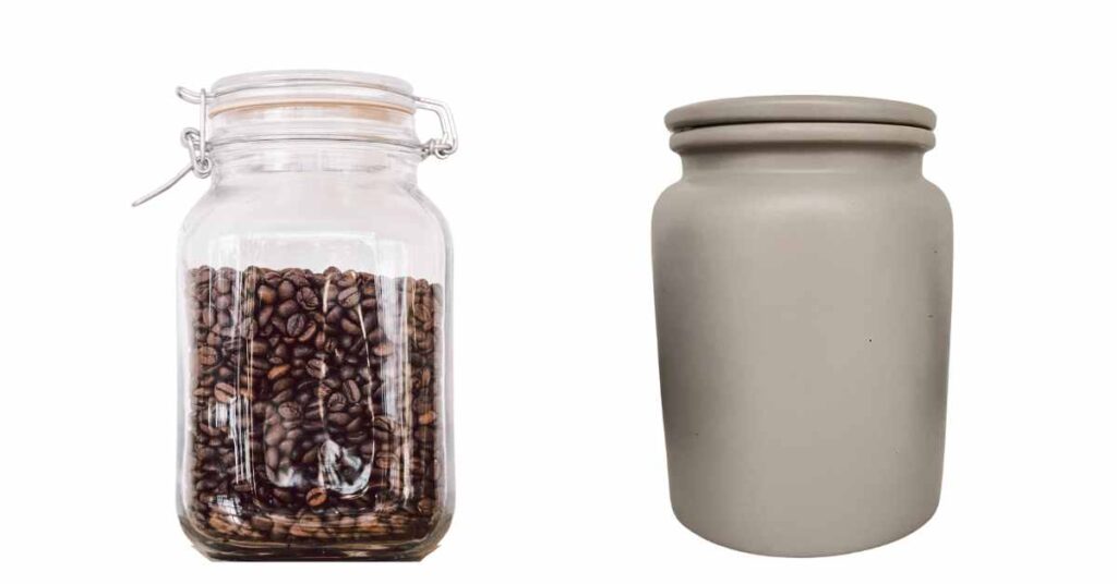 storage option for flavored organic coffee beans a clear mason jar and an opaque gray jar