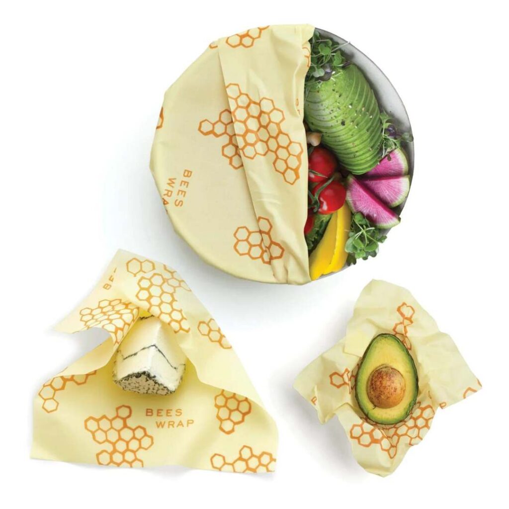 safe food storage wraps made of cotton and beeswax, they are yellow with a honeycomb pattern