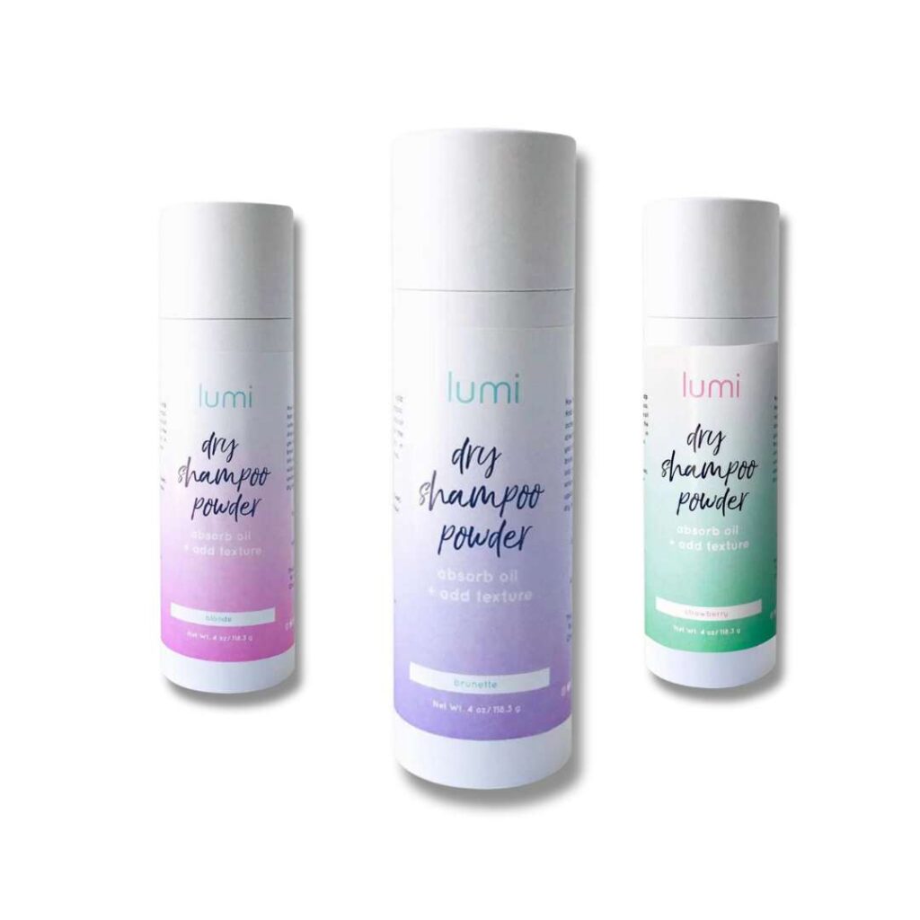 eco-friendly dry shampoo in recyclable cardboard. Three versions shown, one for blonde, one for brunette and one for strawberry